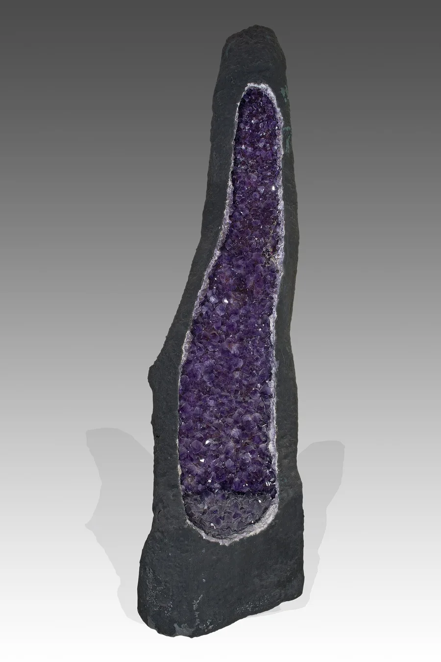 A tall amethyst cathedral geode